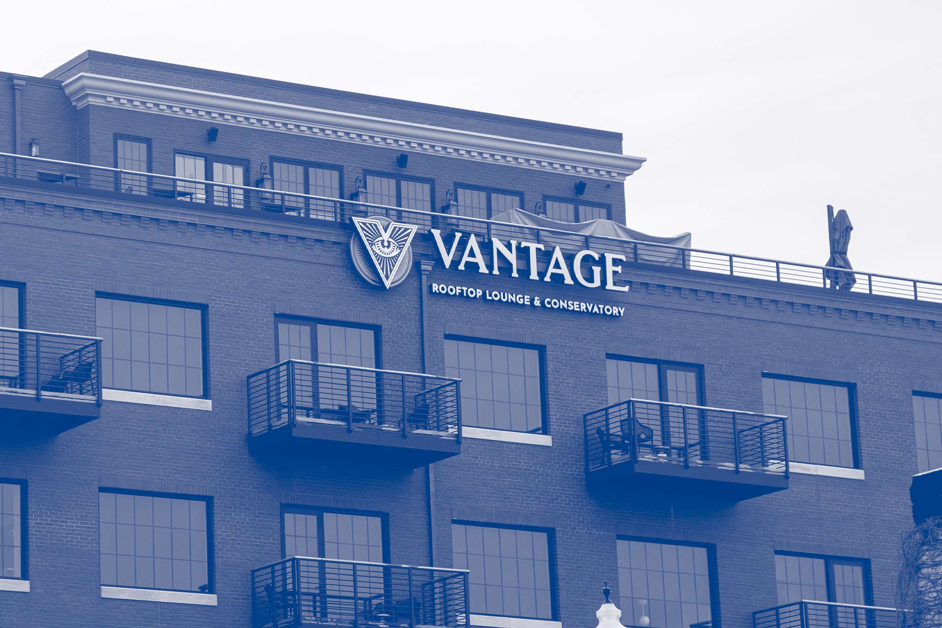 Vantage rooftop lounge and conservatory blue duotone